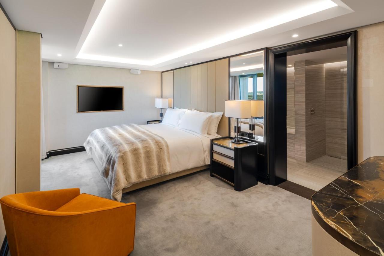 Five Zurich - Luxury City Resort Bagian luar foto A bedroom at the hotel