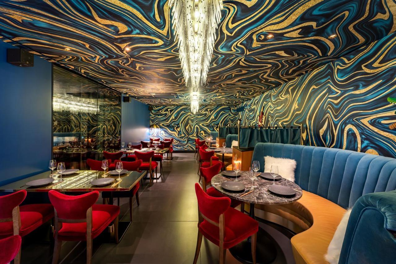 Five Zurich - Luxury City Resort Bagian luar foto Restaurant in London